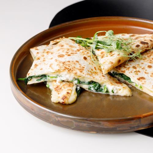 Mexican tortilla with spinach, feta and cheese