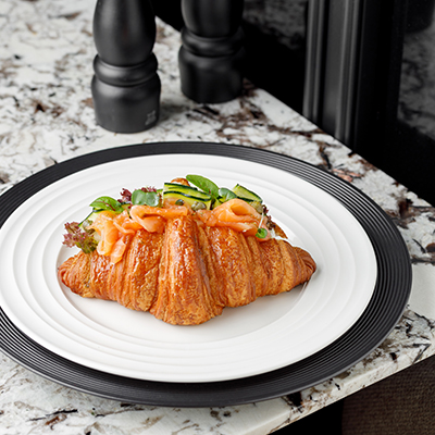Croissant with salmon and avocado paste